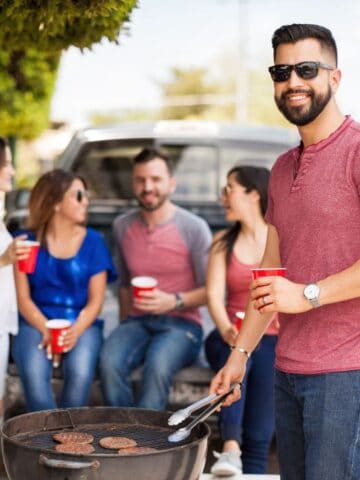 man grilling burgers