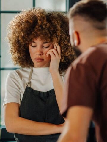 upset woman in kitchen