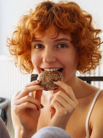 woman eating a cookie