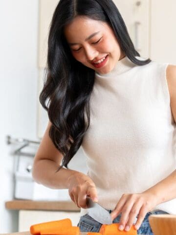 woman making salad