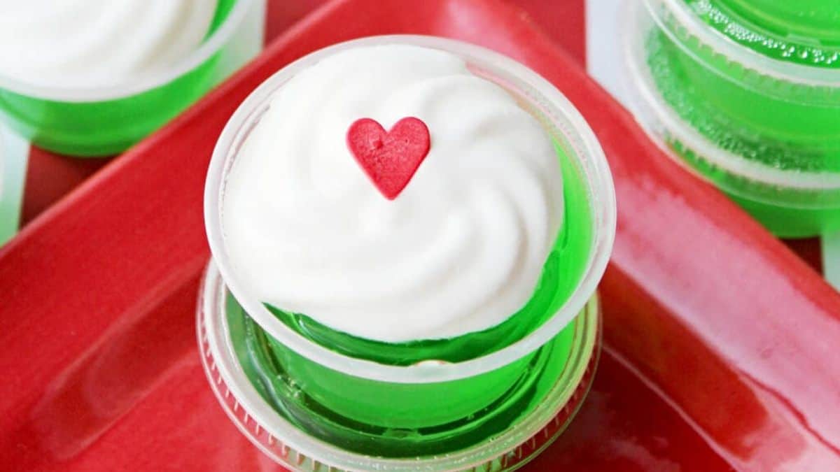 A close up shot of a serving of Grinch Jello Shots.