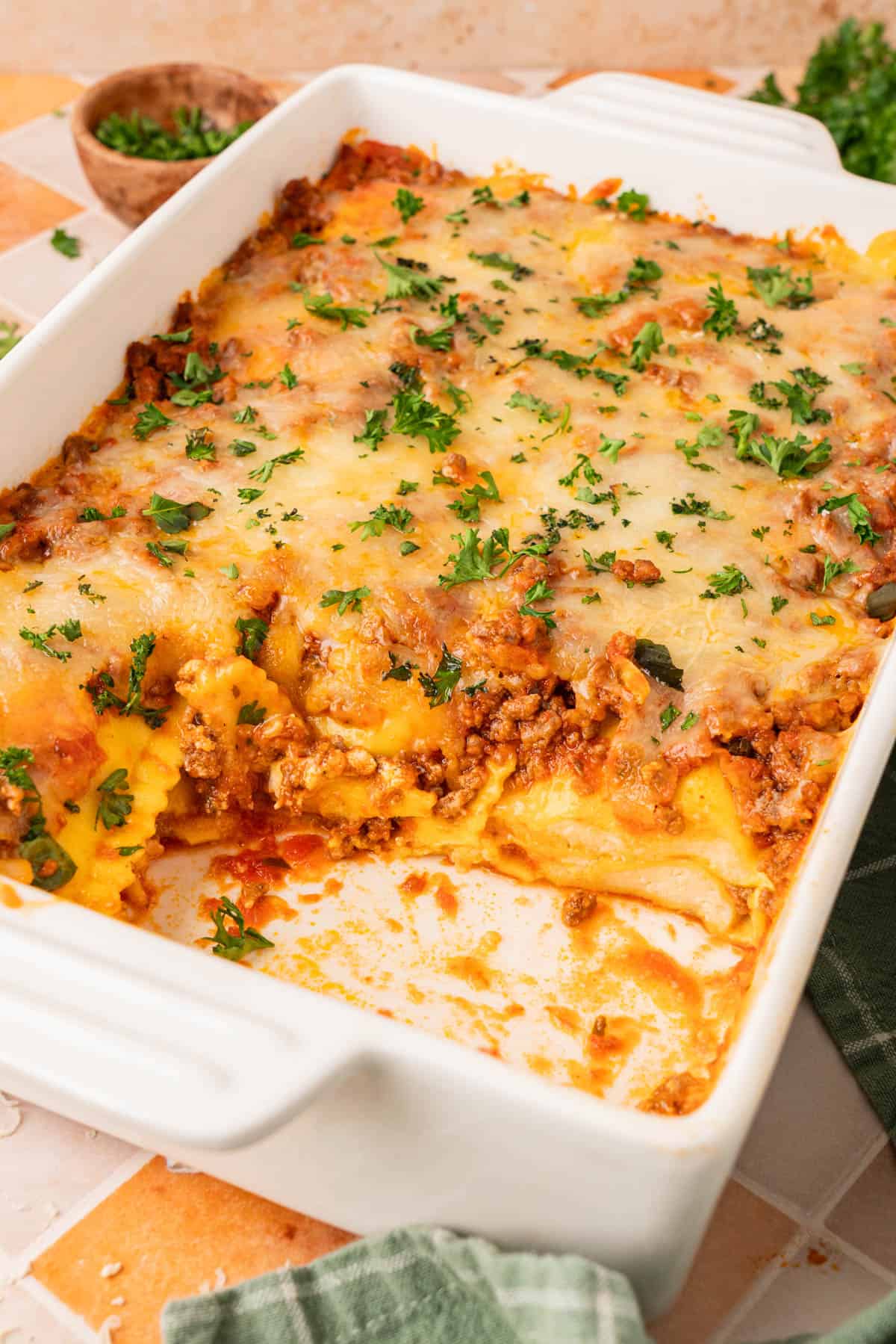ravioli lasagna in a white casserole