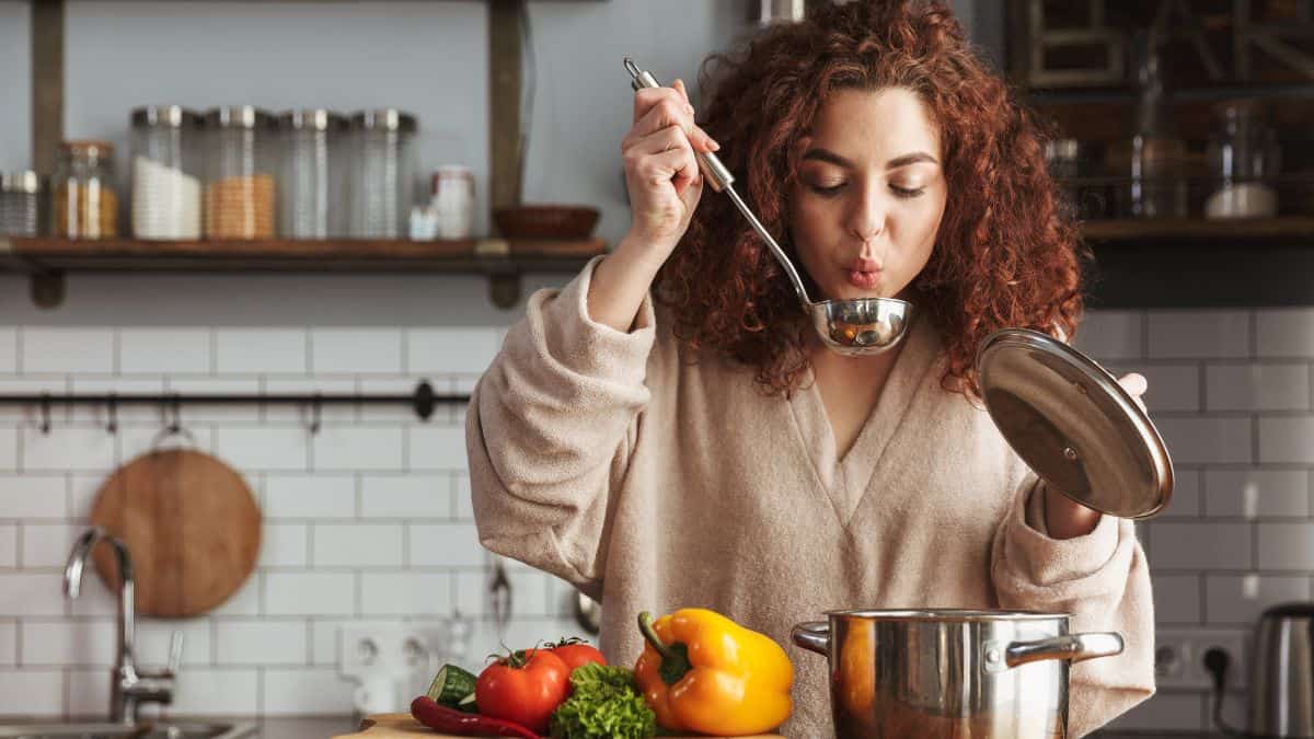 woman making soup