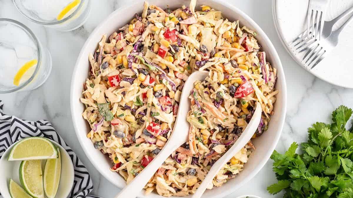 Mexican coleslaw served in a big white bowl.