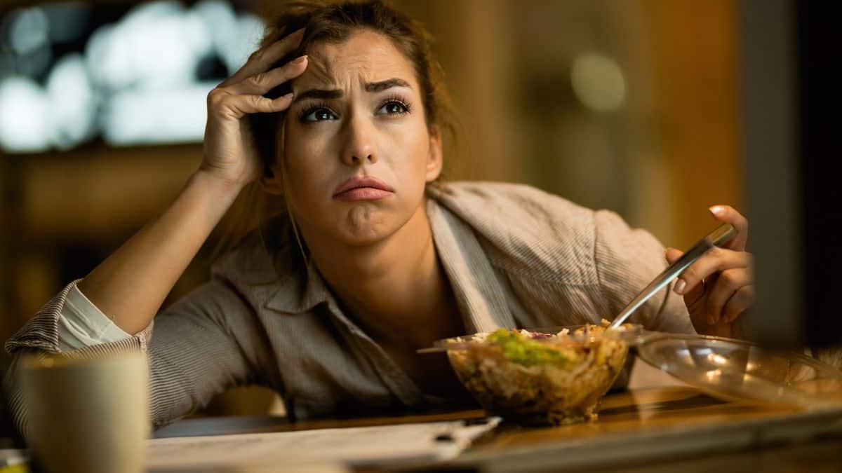 confused woman with salad