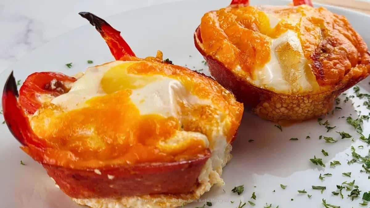 A close-up shot of two breakfast muffins.