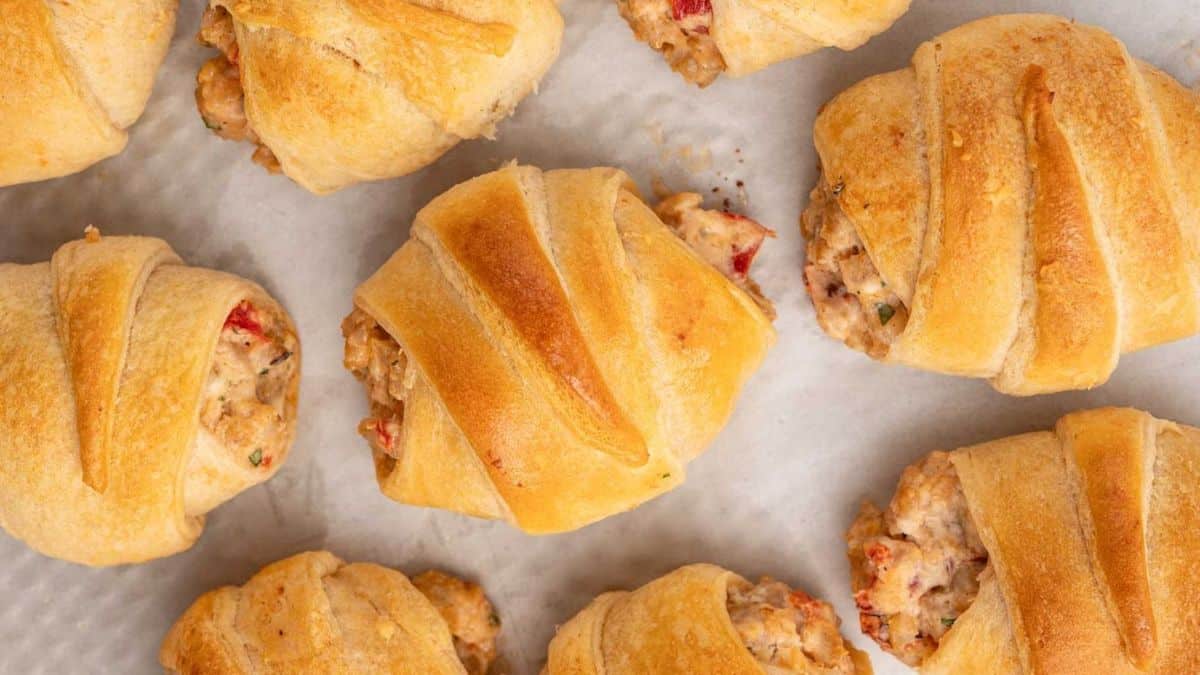Top shot of multiple pieces of Sausage Cream Cheese Crescent Rolls.