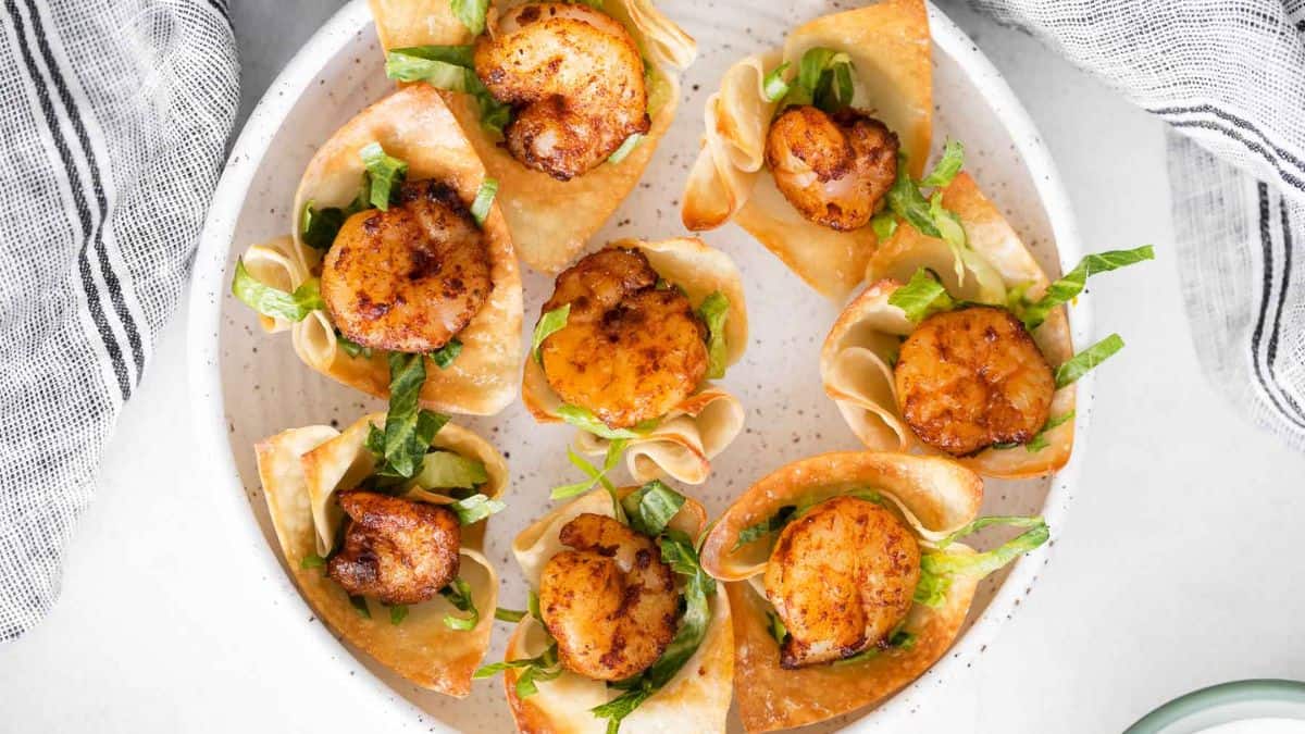 A top shot of a plateful of Shrimp Taco Bites set on a plate. 