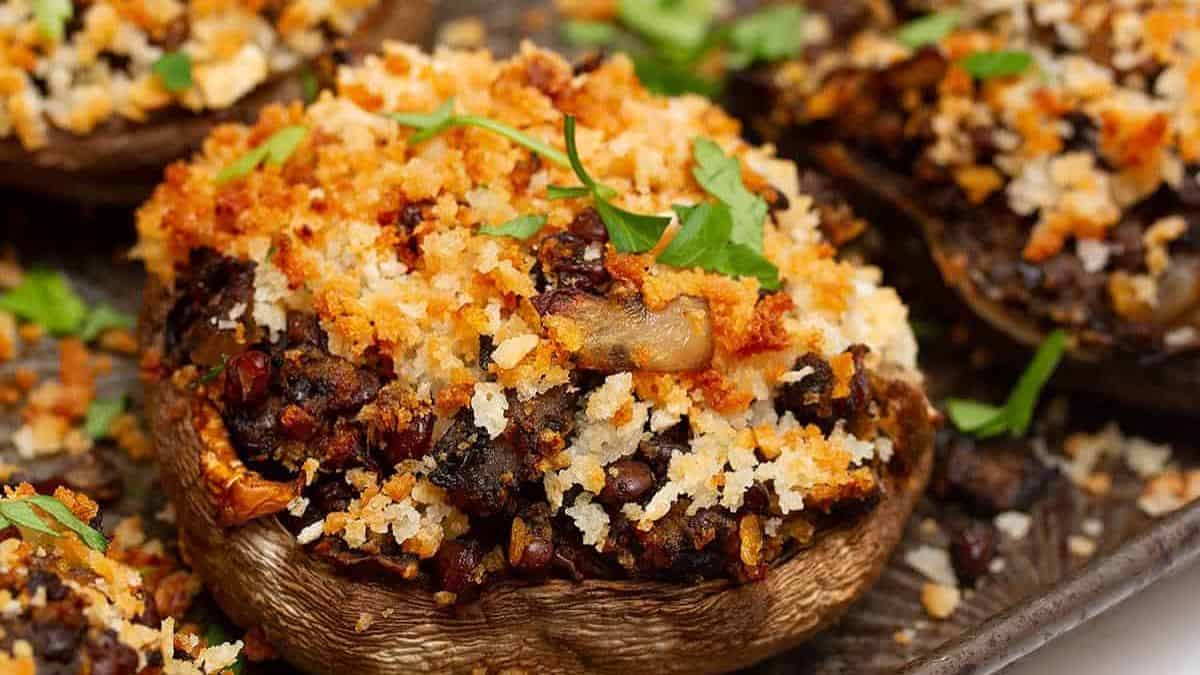 A close-up shot of stuffed portobello mushrooms. 