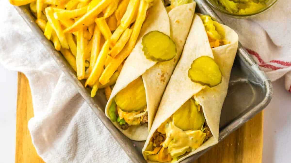 Big Mac Wraps set on a tray with fries on the side. 