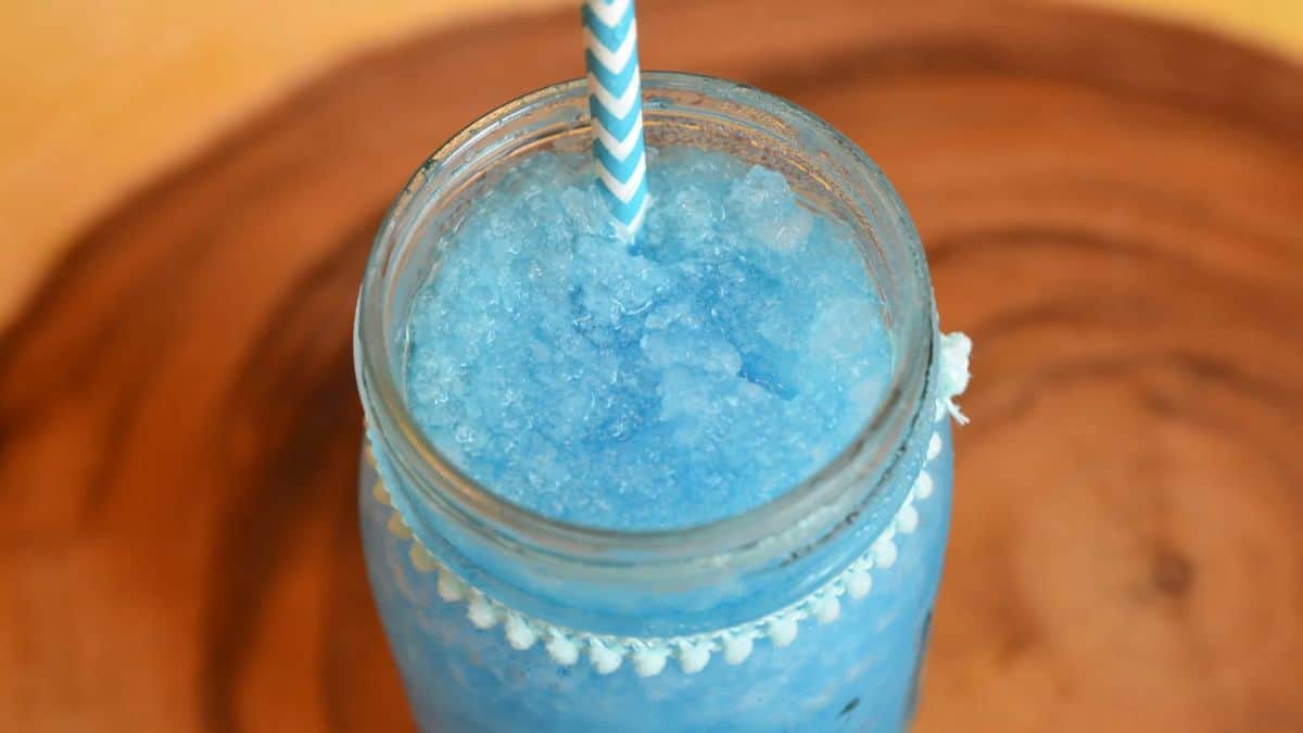 Mason jar filled with blue slushies