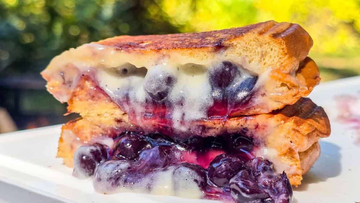 A close-up shot of Blueberries Hand Pies halved.