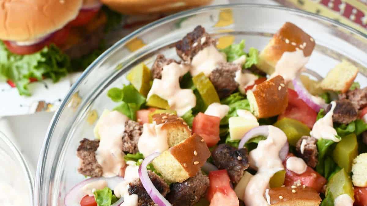 Cheeseburger salad with ground beef, cheese, tomatoes and Thousand Island dressing.