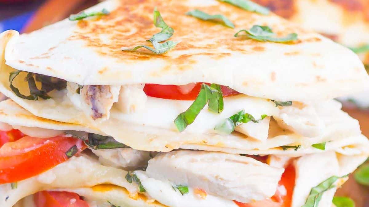 Chicken Caprese quesadillas with grilled chicken, mozzarella, tomatoes and basil.