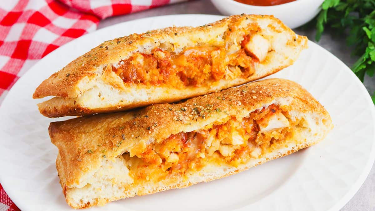 Golden chicken parmesan stromboli stuffed with chicken, marinara and cheese.