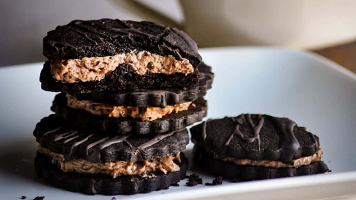 Four pieces of Coffee & cream Cookies set on a plate. 