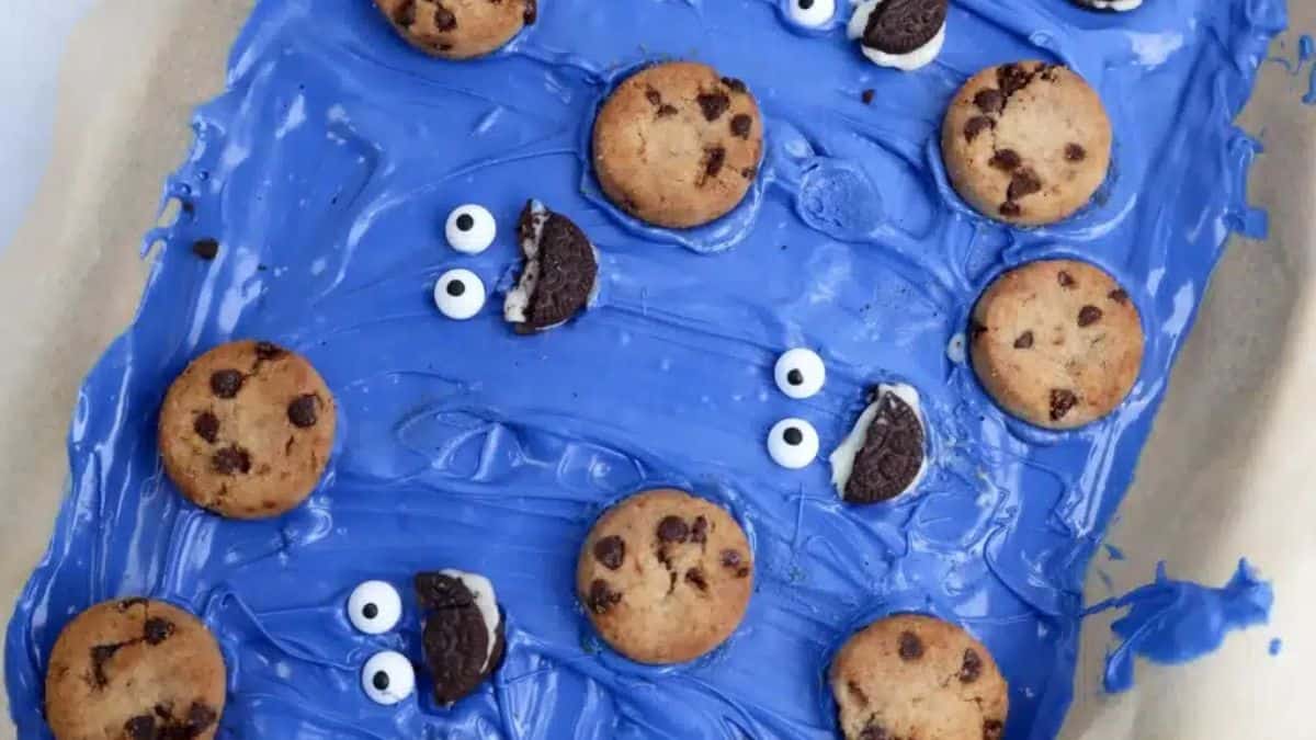 Cookie Monster themed bark set on a baking pan.