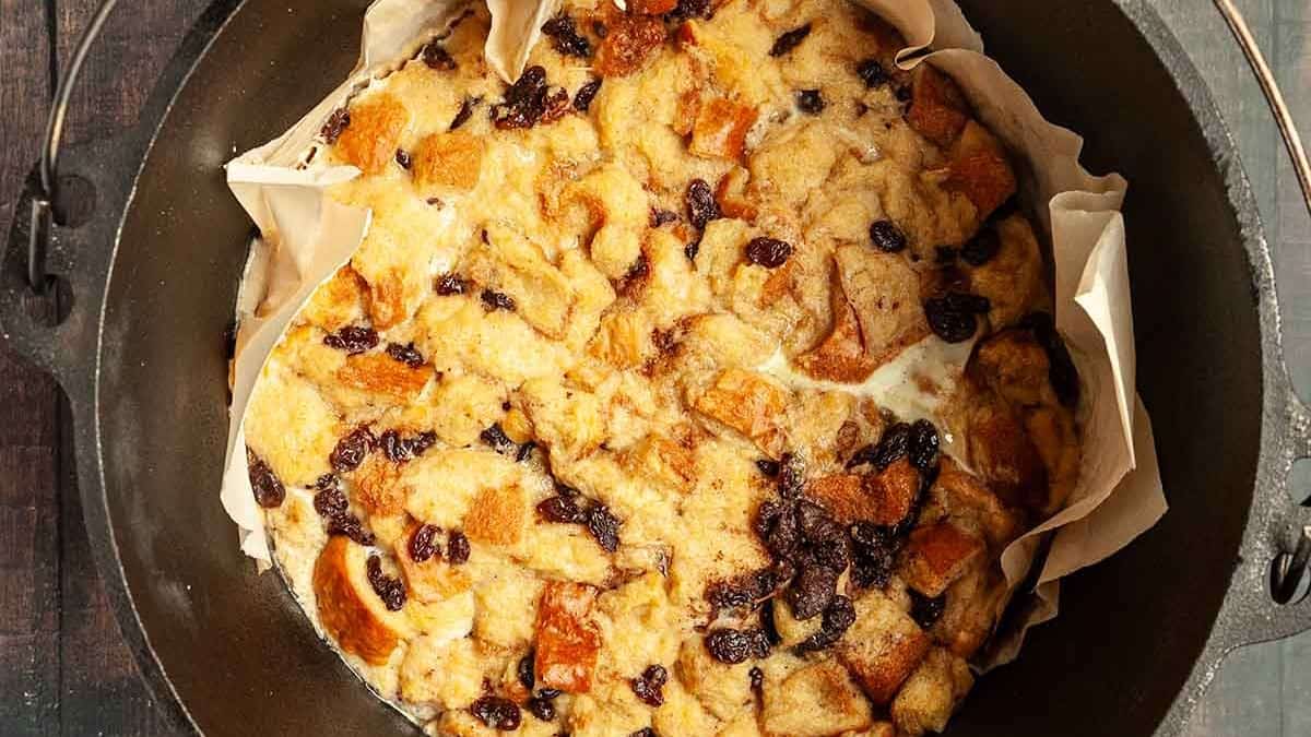 Top shot of a bread pudding cooked in a Dutch oven.