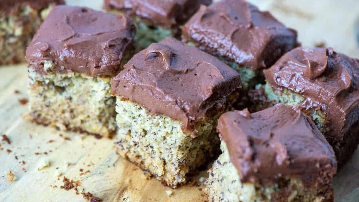 Gluten-free banana cake topped with chocolate frosting.