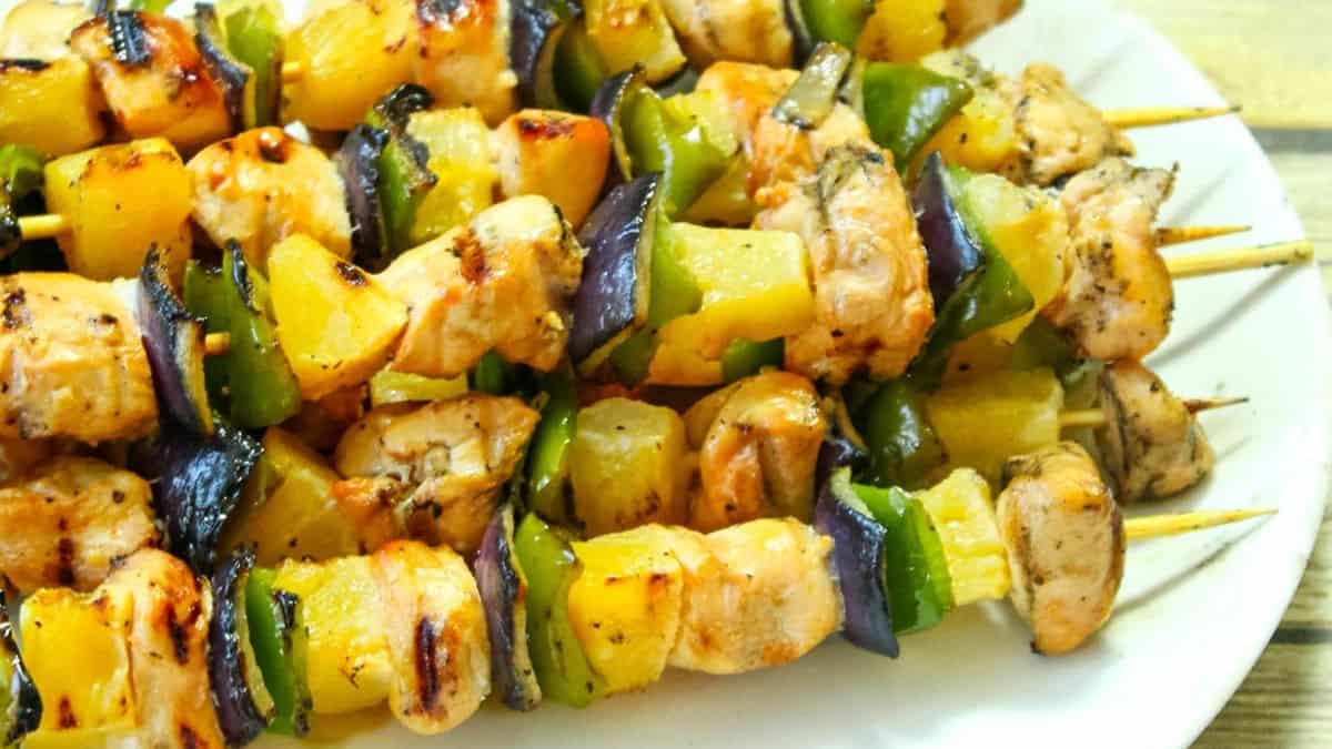 Hawaiian chicken kabobs with pineapple, chicken and colorful bell peppers.