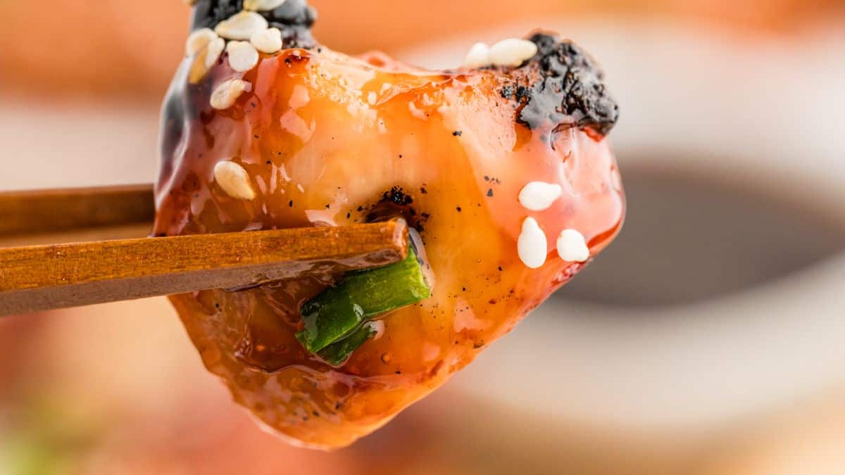 Grilled yakitori chicken skewers with charred edges and savory glaze.