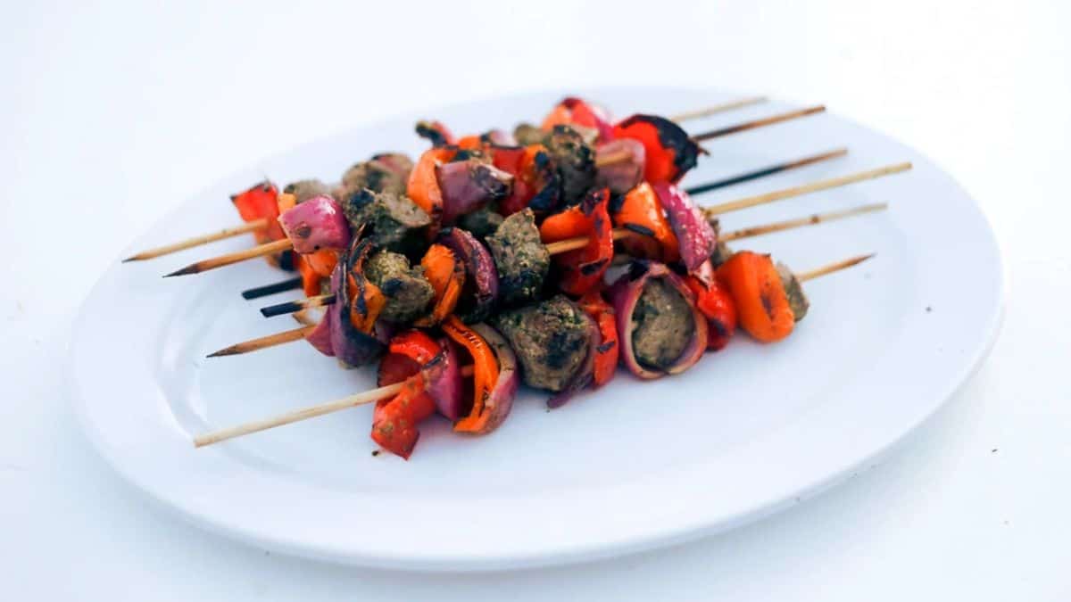 Lime and basil beef kebabs with citrus-marinated beef on skewers.