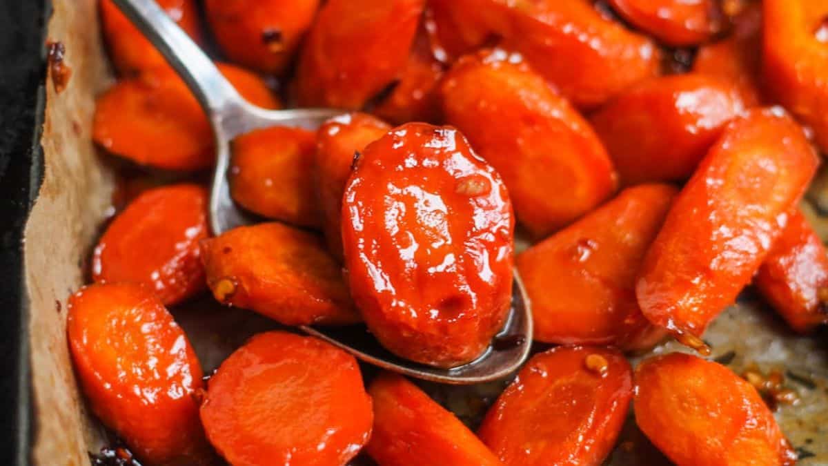A close-up shot of maple roasted carrots slices. 