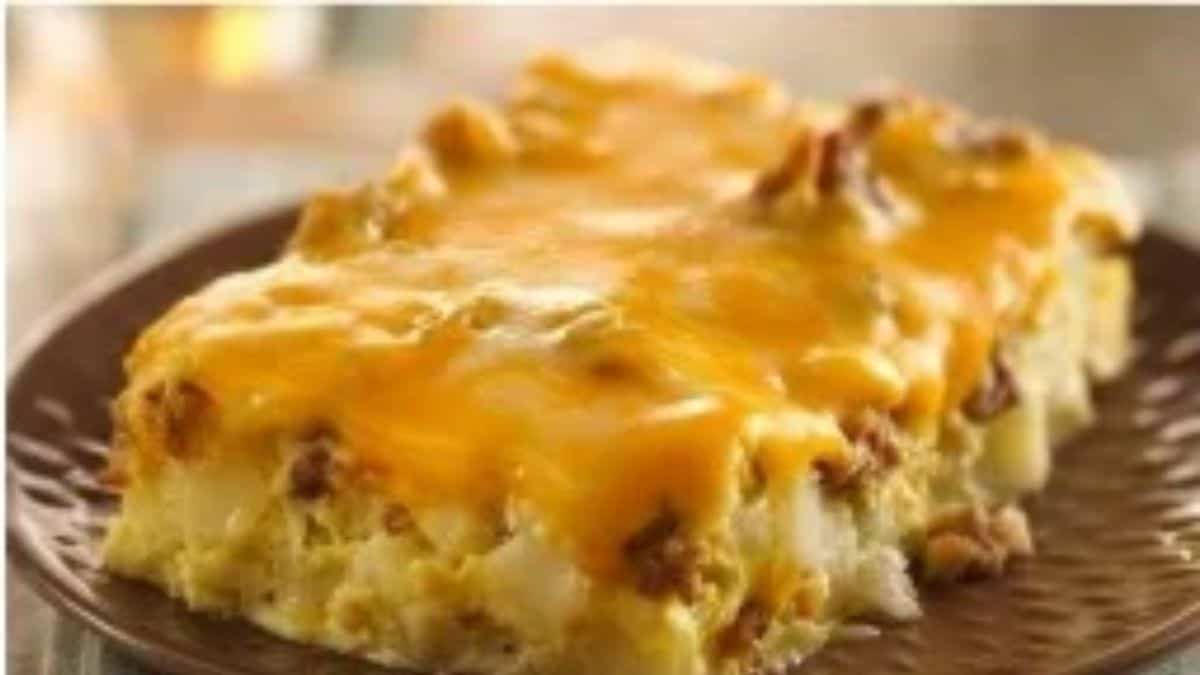 A close-up shot of a slice of tex-mex egg bake on a plate. 