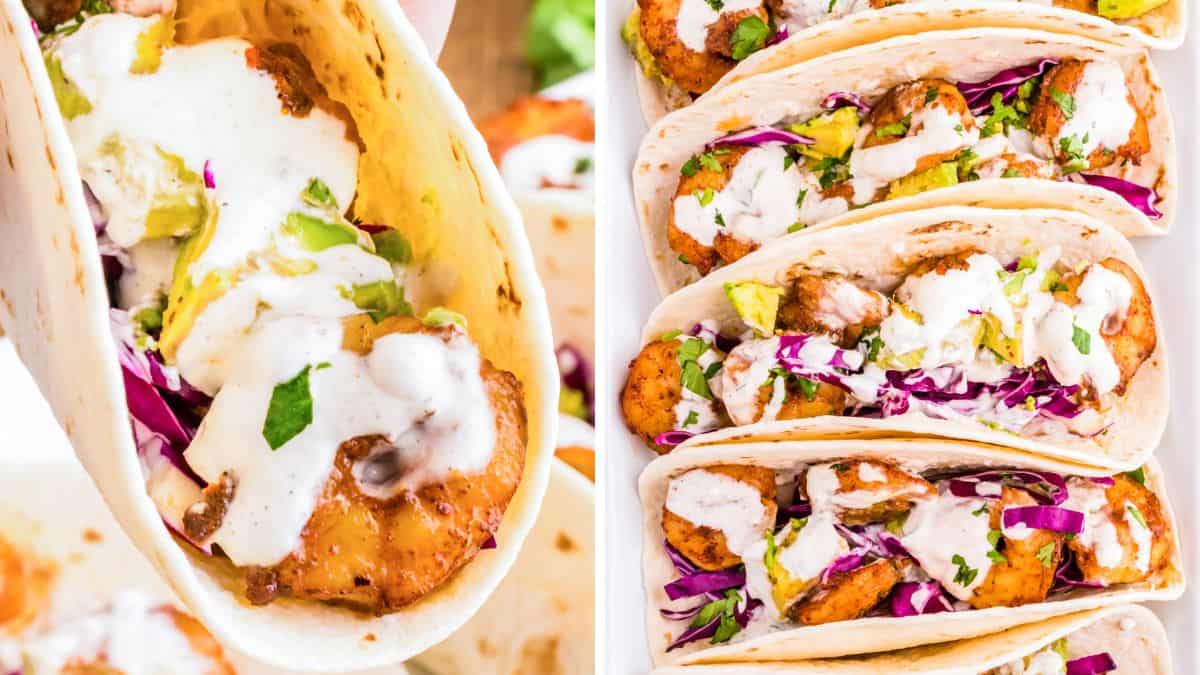 Shrimp tacos with seasoned shrimp, fresh slaw and lime in tortillas.