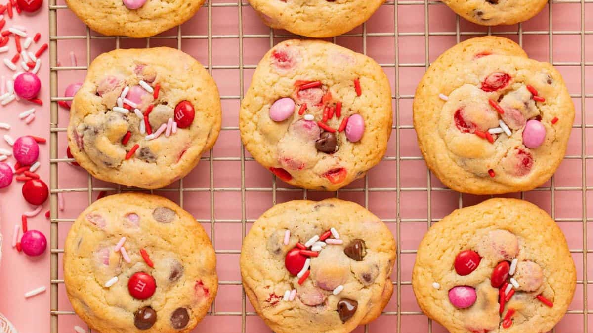 Flat lay shot of a couple of cookies on top of a cooling wire rack. 