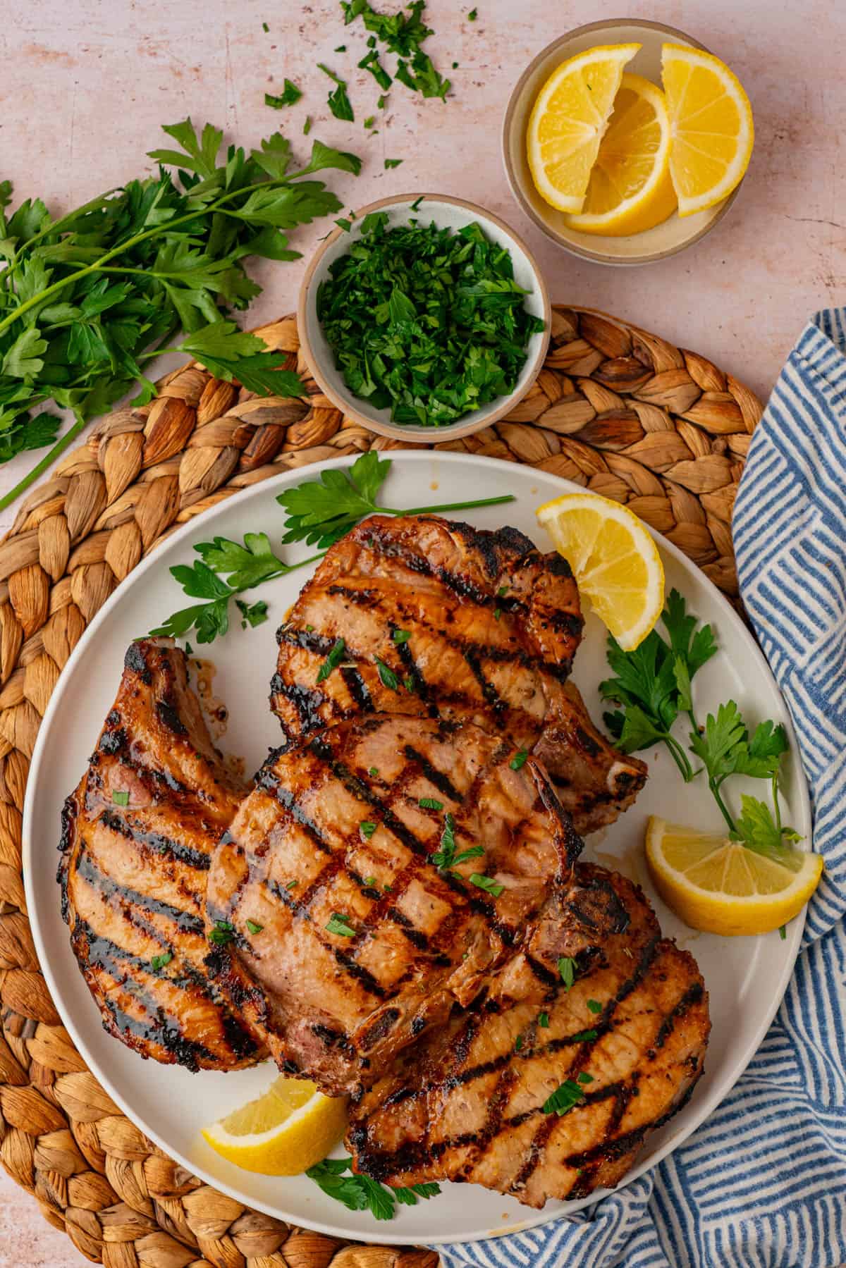 A plate with grilled pork chops.