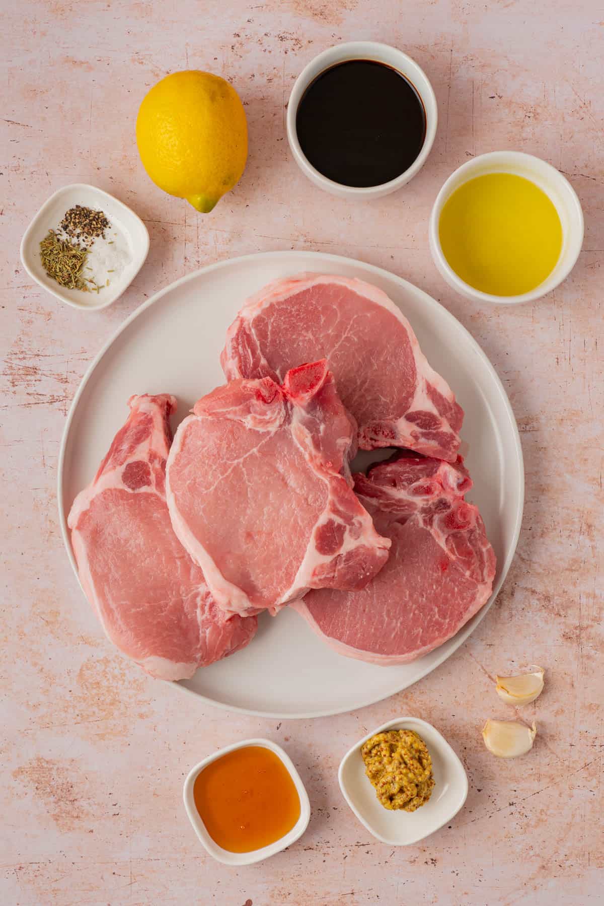 The ingredients for grilled pork chops with marinade.