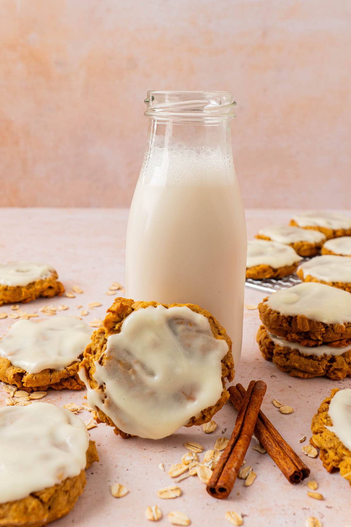 The oatmeal cookies with a glass of milk. 