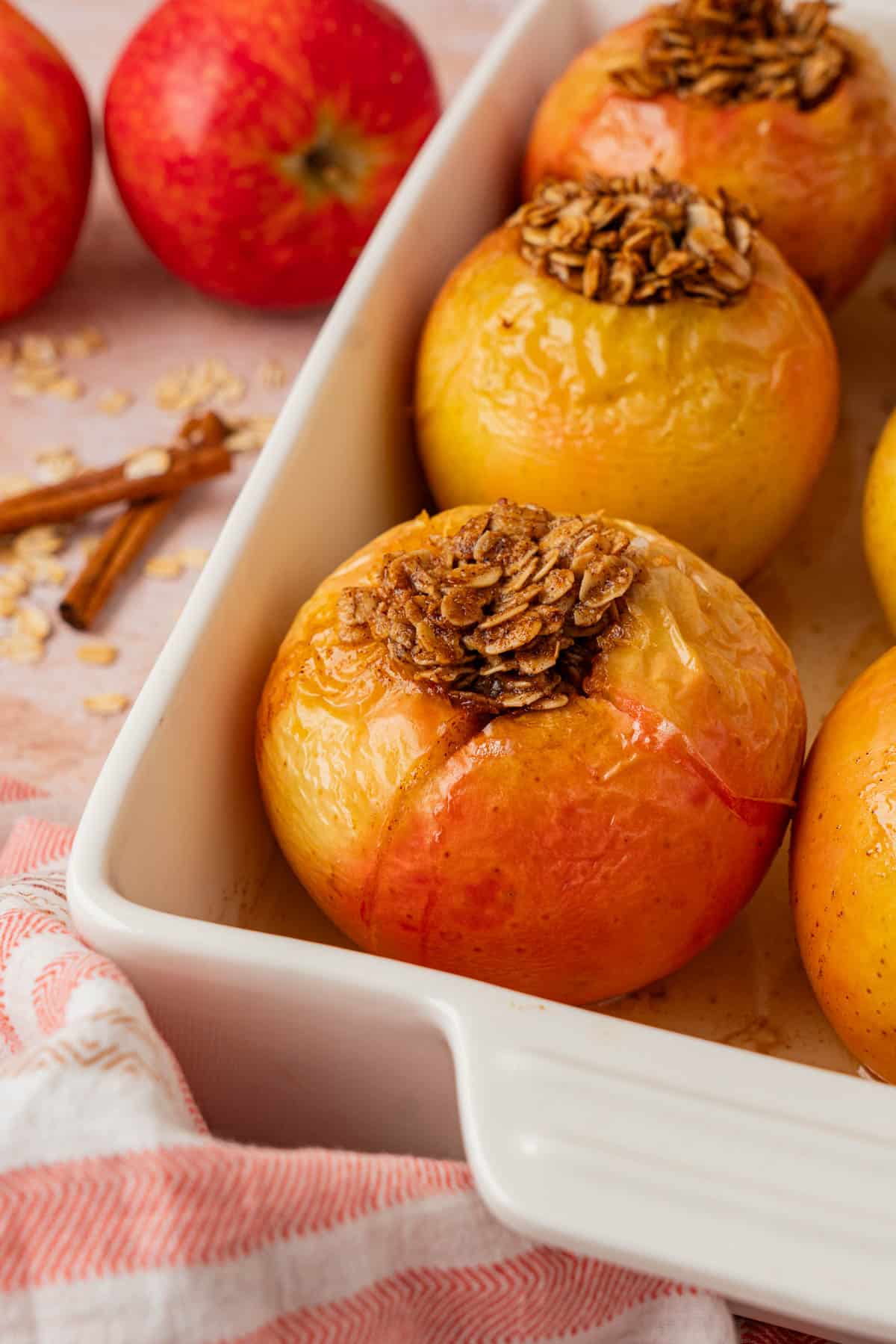 Close-up of a baked apple stuffed with cinnamon oat filling