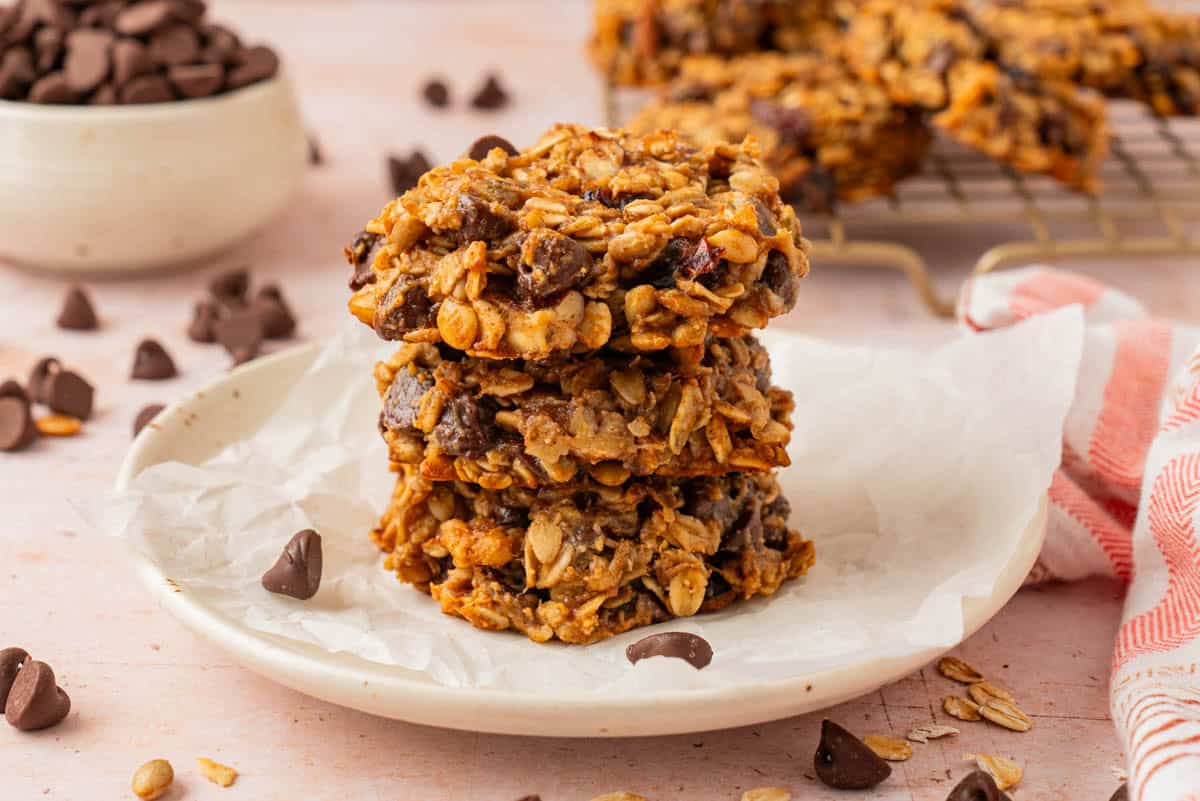 A stack of oatmeal breakfast cookies on a plate. 