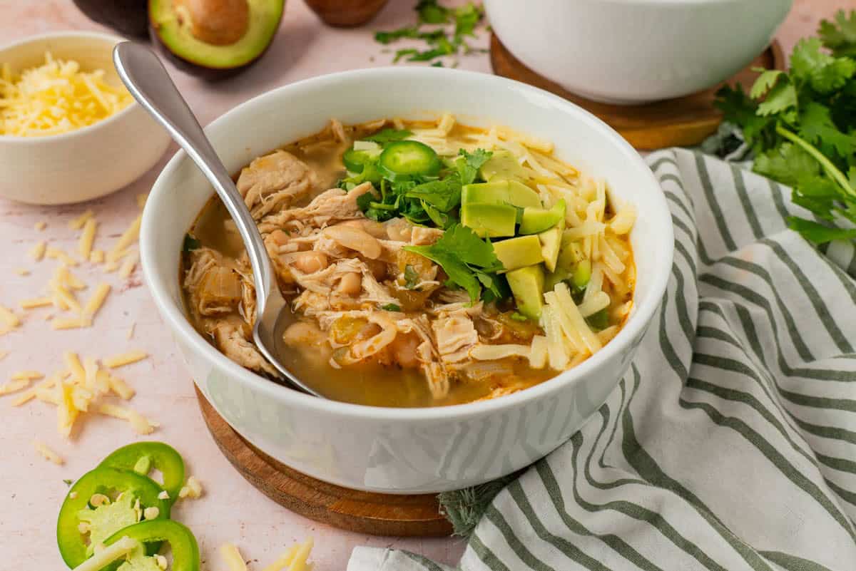 A swerving of white bean chicken chili presented beautifully.
